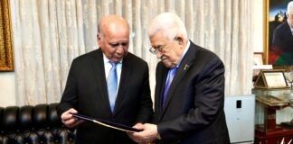Iraq Delivers Official Invitation to Palestinian President for Upcoming Arab Summit