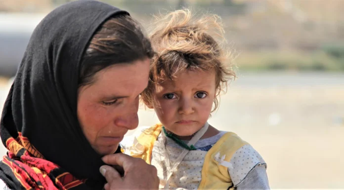 Yazidi Families Receive Remains of 22 Victims