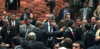 Iraqi Parliament Erupts Amid Regional Tensions and US Embassy Attack
