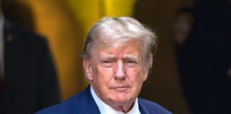 Trump Attends the Return of U.S. Troops Killed in Iraq Crash During a Solemn Ceremony at Dover Air Force Base.