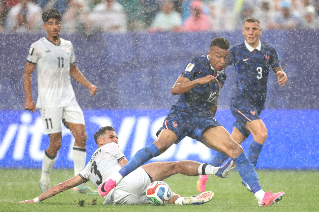 France Beat Iraq 3-0 after a Two-Hour World Cup Storm Delay