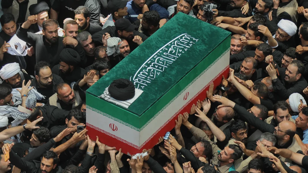 Khamenei’s Coffin Returns to Iran After Iraq Farewell