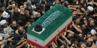 Khamenei’s Coffin Returns to Iran After Iraq Farewell