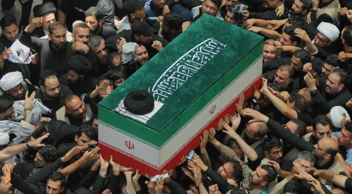 Khamenei’s Coffin Returns to Iran After Iraq Farewell